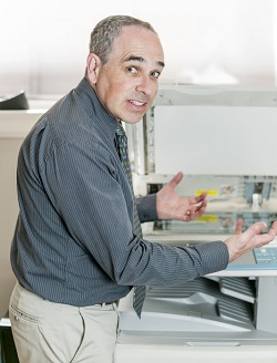 Man frustrated because scanner is not working